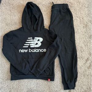 Black girl’s New Balance Sweatsuit. Gently warn.